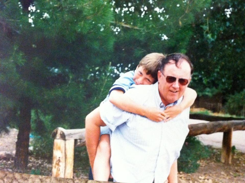 Photograph of midlife Herb Munson with son, 
			Jonathan.